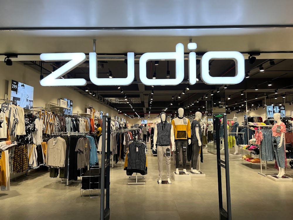 Interior view of Zudio clothing store franchise in India with clothing displays and checkout counter