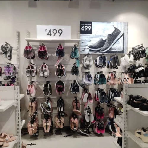 Footwear section with shoes and sandals at a Zudio store