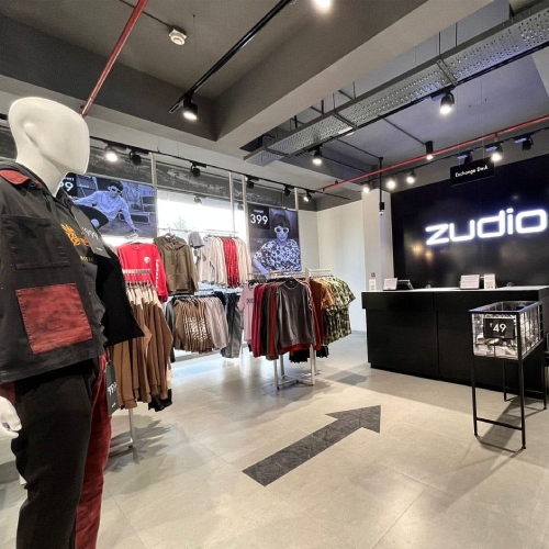 Interior of a Zudio clothing store in India with product displays and checkout area